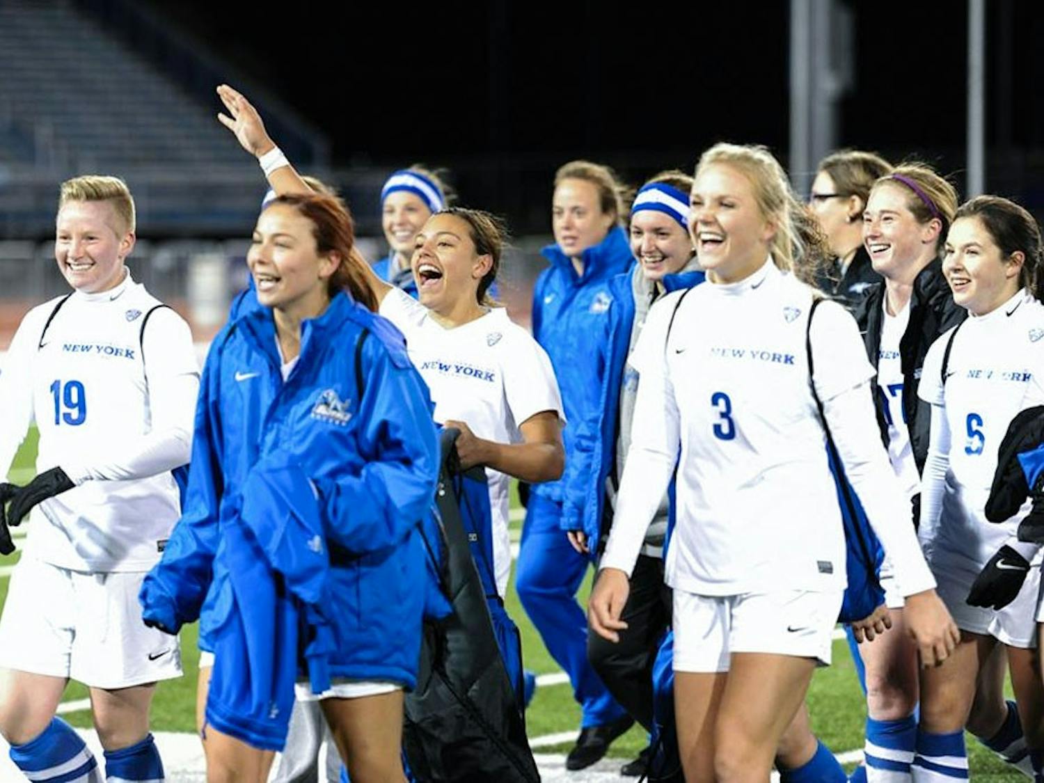 Members of the 2015-16 UB women's soccer team celebrate after a matchup in the MAC Tournament. Kay players will not return next year, but a solid spring season leaves Shawn Burke relaxed about replacing them.&nbsp;