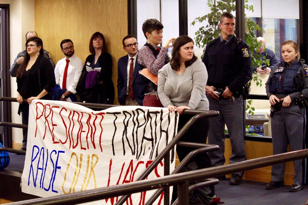 <p>Demonstrators from the Living Stipend Movement marched through the academic spine to Capen Hall on Monday afternoon. This is the group's third protest this semester to demand a "living stipend."</p>