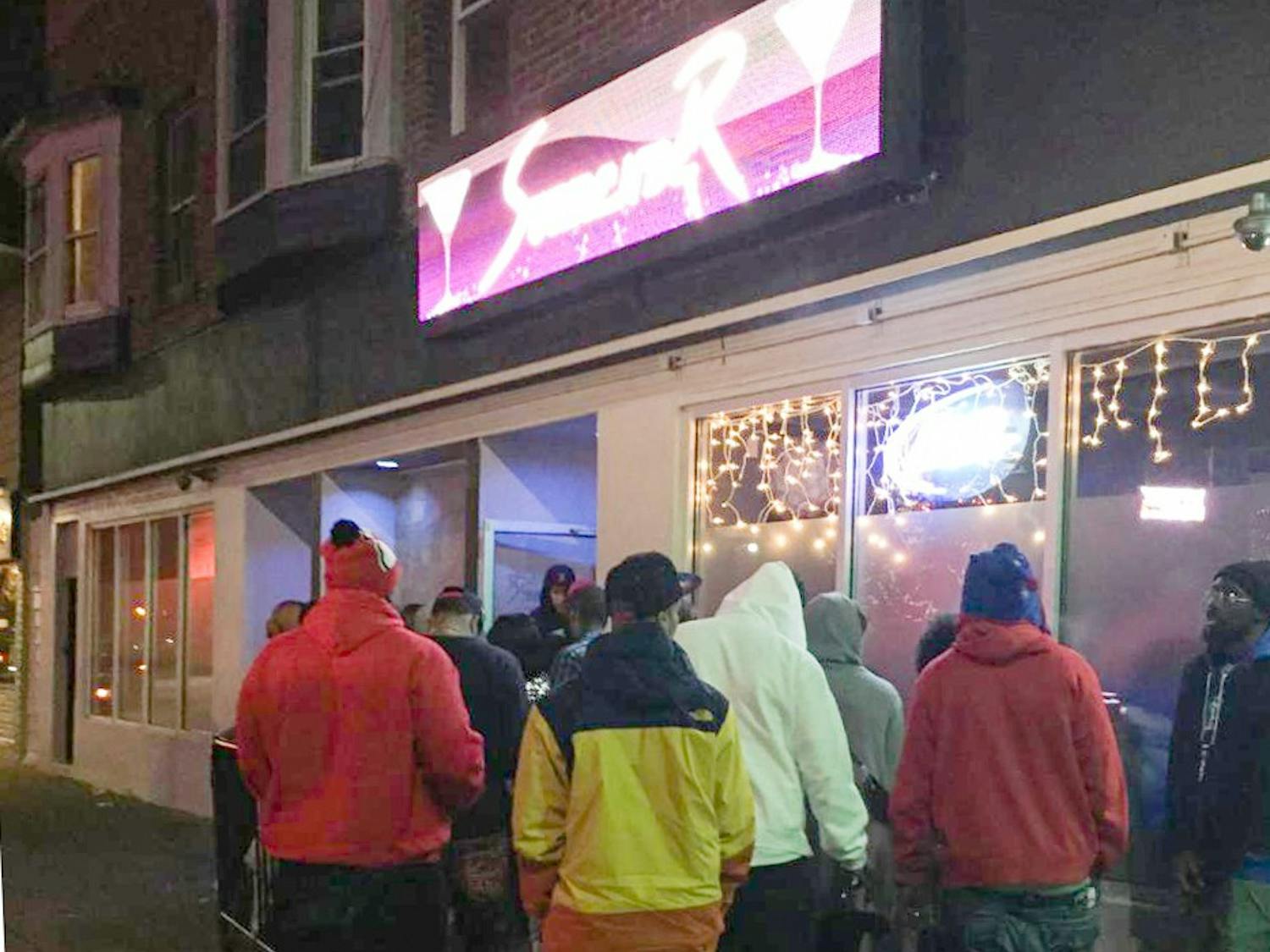Patrons wait in line at&nbsp;Surrender, the only 18-and-up bar on Main Street in the&nbsp;University&nbsp;Heights. Surrender&nbsp;has become popular with students this semester after the police crackdown on house parties.&nbsp;