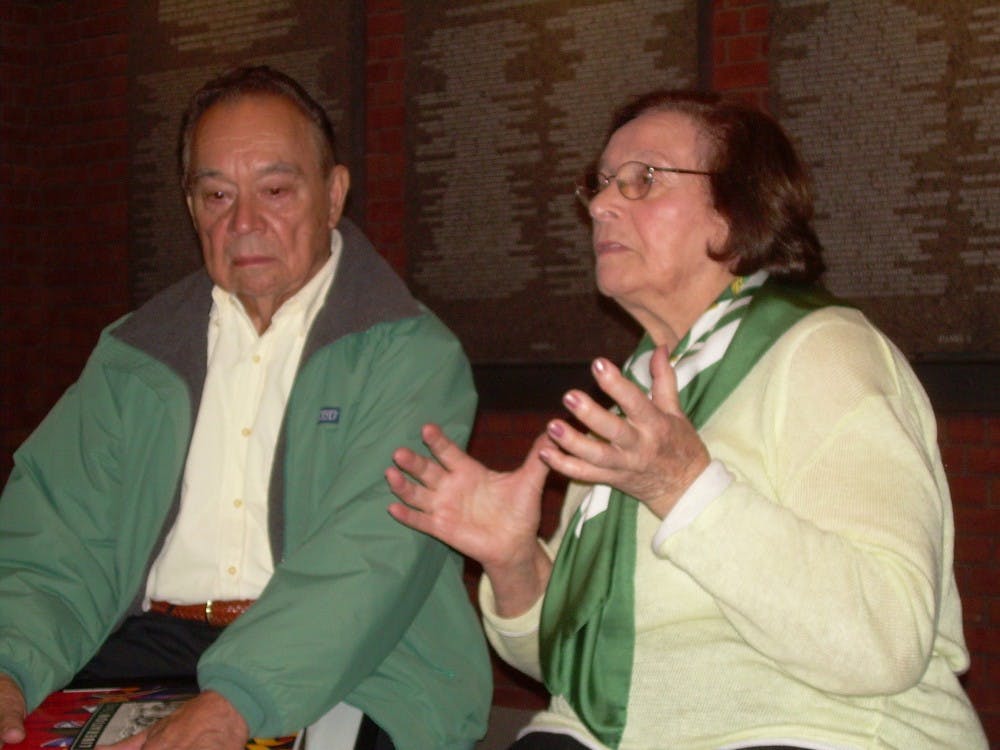 (left to right) Charles Byrd and Edith Fischgrund Plakins sit together in the Holocaust Museum in Washington. Byrd shot open the gate of the concentration camp Plakins was held in during the Holocaust. &nbsp;