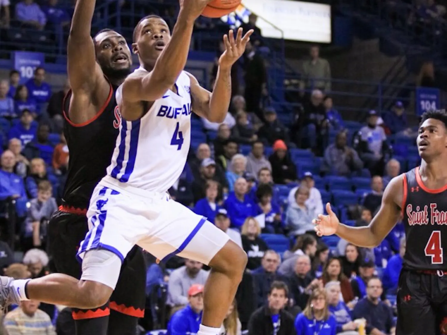 Junior guard Davonta Jordan looks for the layup in the guarded paint. Jordan and the Bulls will head to Belfast, Northern Ireland for two games this weekend.