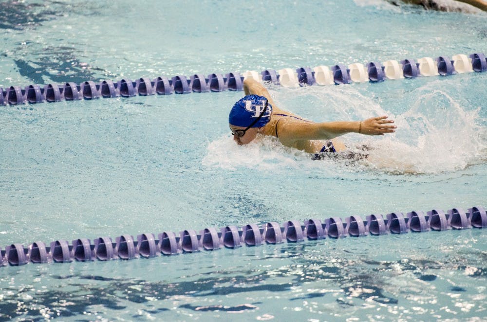 <p>A women’s swimmer is competing in the butterfly heat during a match in October of 2015. The women’s swimming and diving team competed in the MAC Championships over the weekend.</p>