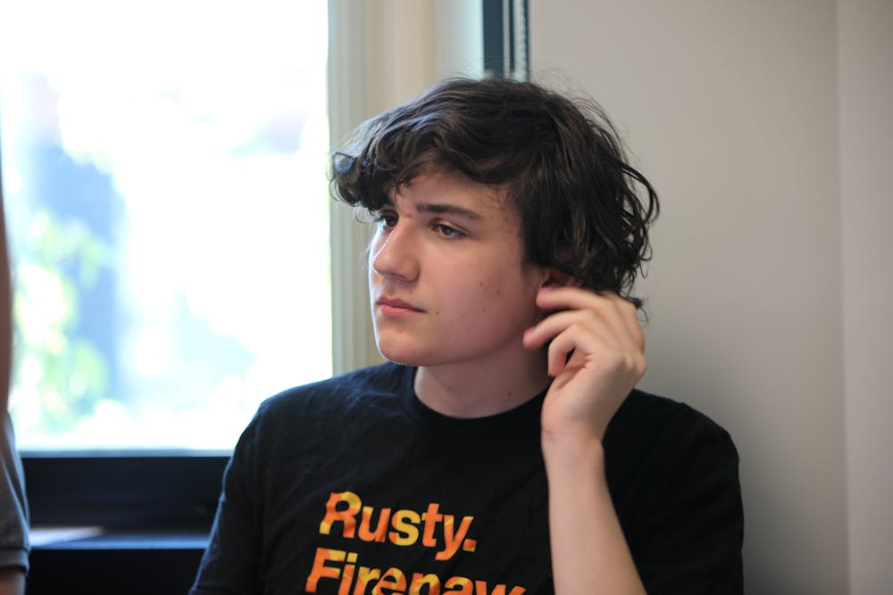 Former UB Council student representative candidate Jack Walsh listens during a Student Association Senate meeting on Wednesday, May 8.