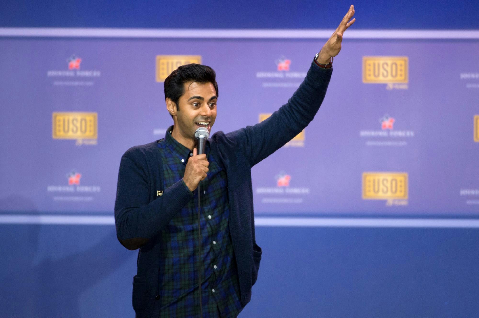 Comedian Hasan Minhaj performs during a comedy show at Joint Base Andrews in Washington in 2016.
