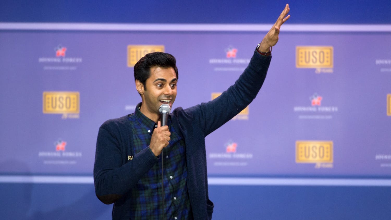 Comedian Hasan Minhaj performs during a comedy show at Joint Base Andrews in Washington in 2016.