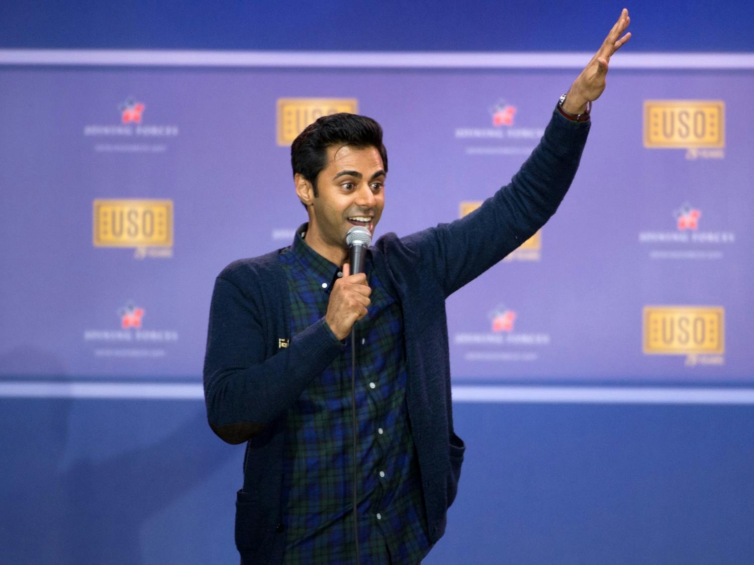 Comedian Hasan Minhaj performs during a comedy show at Joint Base Andrews in Washington in 2016.