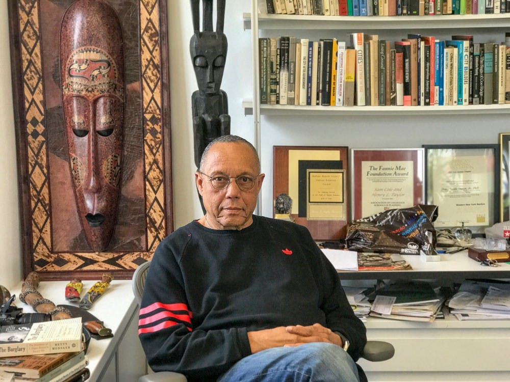 <p>Professor Henry Taylor sits in his office in Hayes Hall. Taylor and other black faculty members&nbsp;feel they are undervalued at UB.</p>