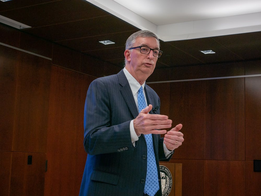 <p>Interim provost A. Scott Weber speaks to an audience during a public forum at the Buffalo Room on Wednesday. Weber is one of five finalists in the search for UB's next provost.</p>