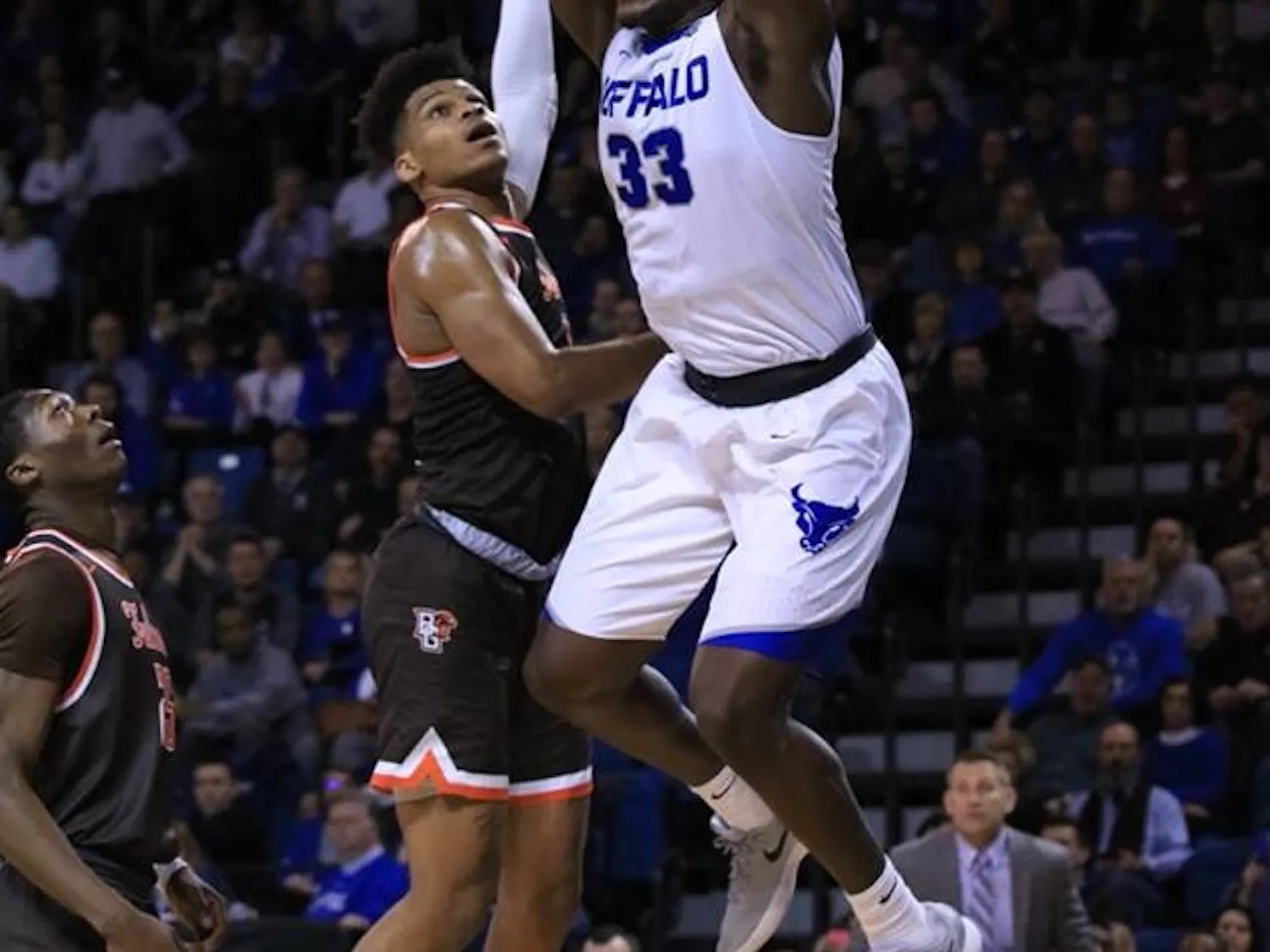 Junior forward Nick Perkins slams the ball down. Perkins finished with 22 points and went 3-of-4 from deep.