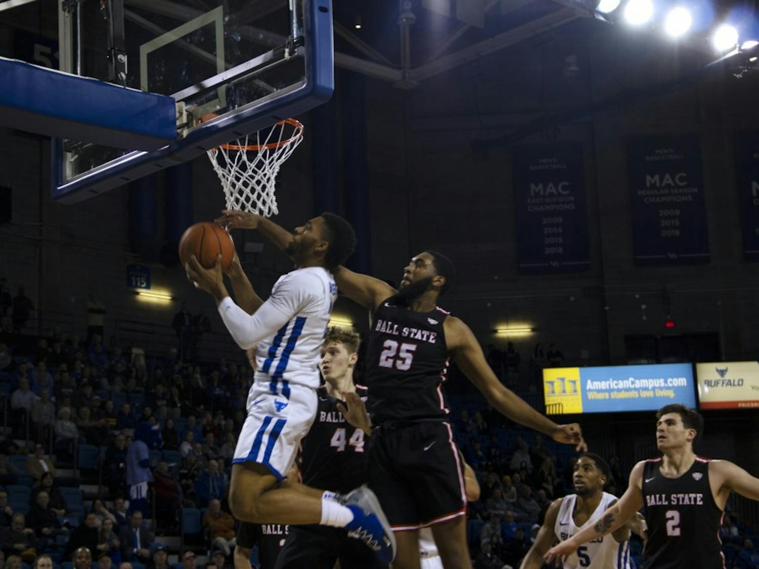 Sophomore guard Jayvon Graves goes up and under the rim for a layup. Graves finished with a double double in the 83-59 win. 