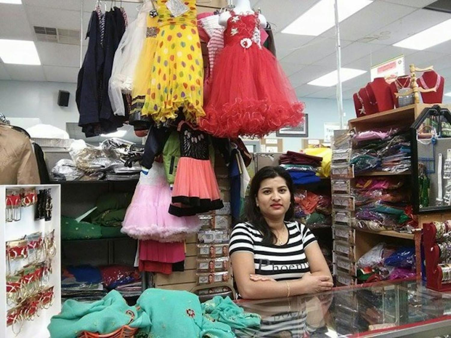 The West Side Bazaar offers refugees and immigrants
the opportunity to connect with their community and
learn entrepreneurial skills. Madhavi Pyakurel (pictured)
works at Nepali Clothing and Cosmetics with her
husband Bhagawat Pyakurel.&nbsp;
Sushmita Gelda, The Spectrum