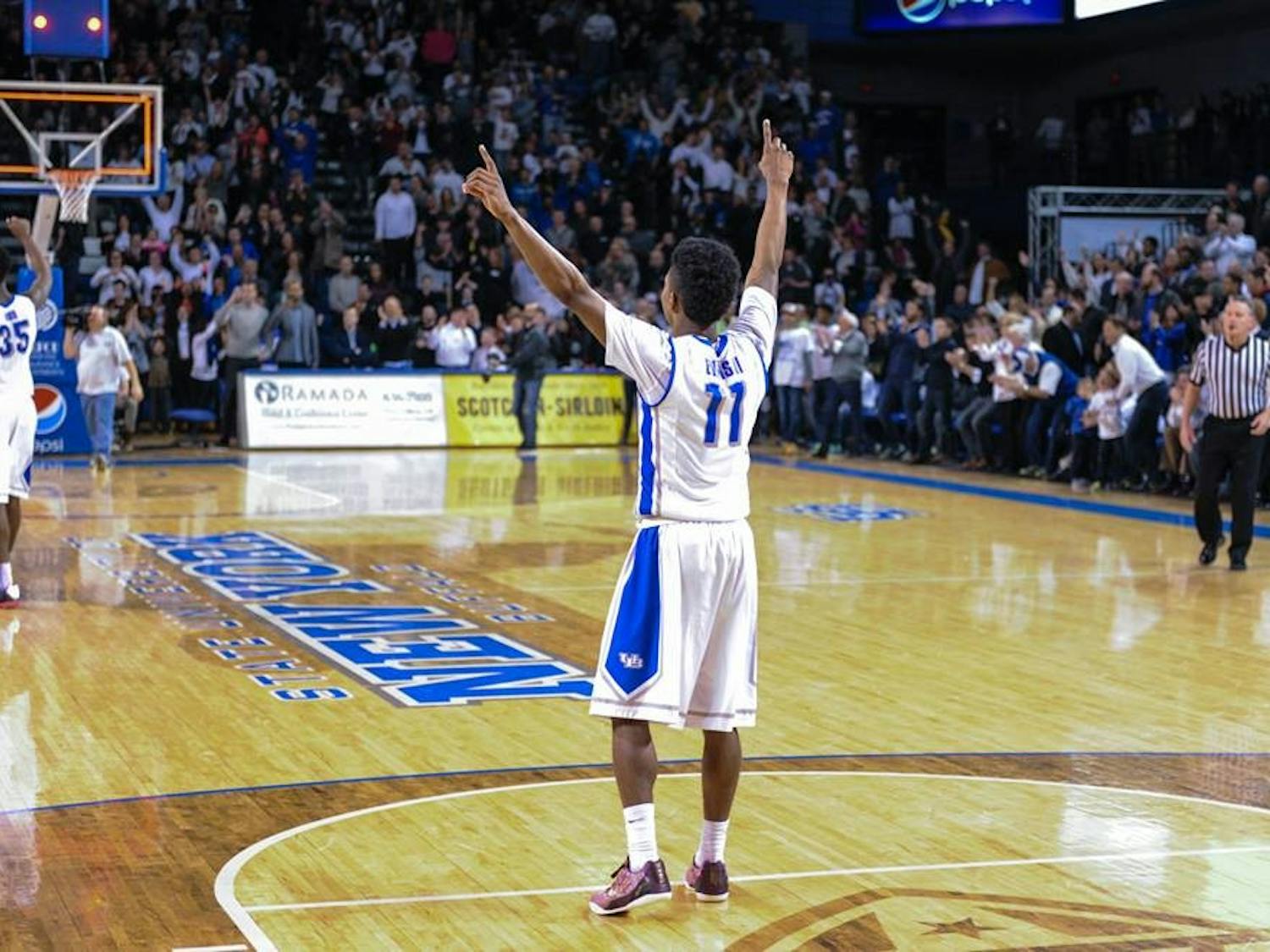Shannon Evans celebrates during Buffalo's 67-62 victory over Akron on on Feb. 24.