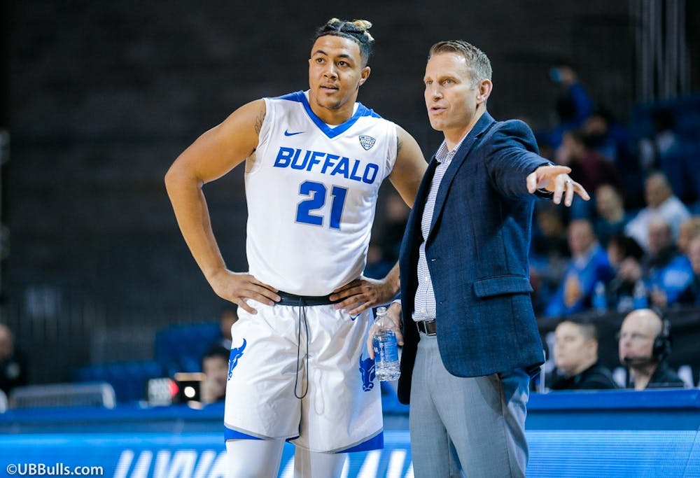 <p>Dominic Johnson (left) and Nate Oats (right) developed a strong bond at UB.&nbsp;</p>