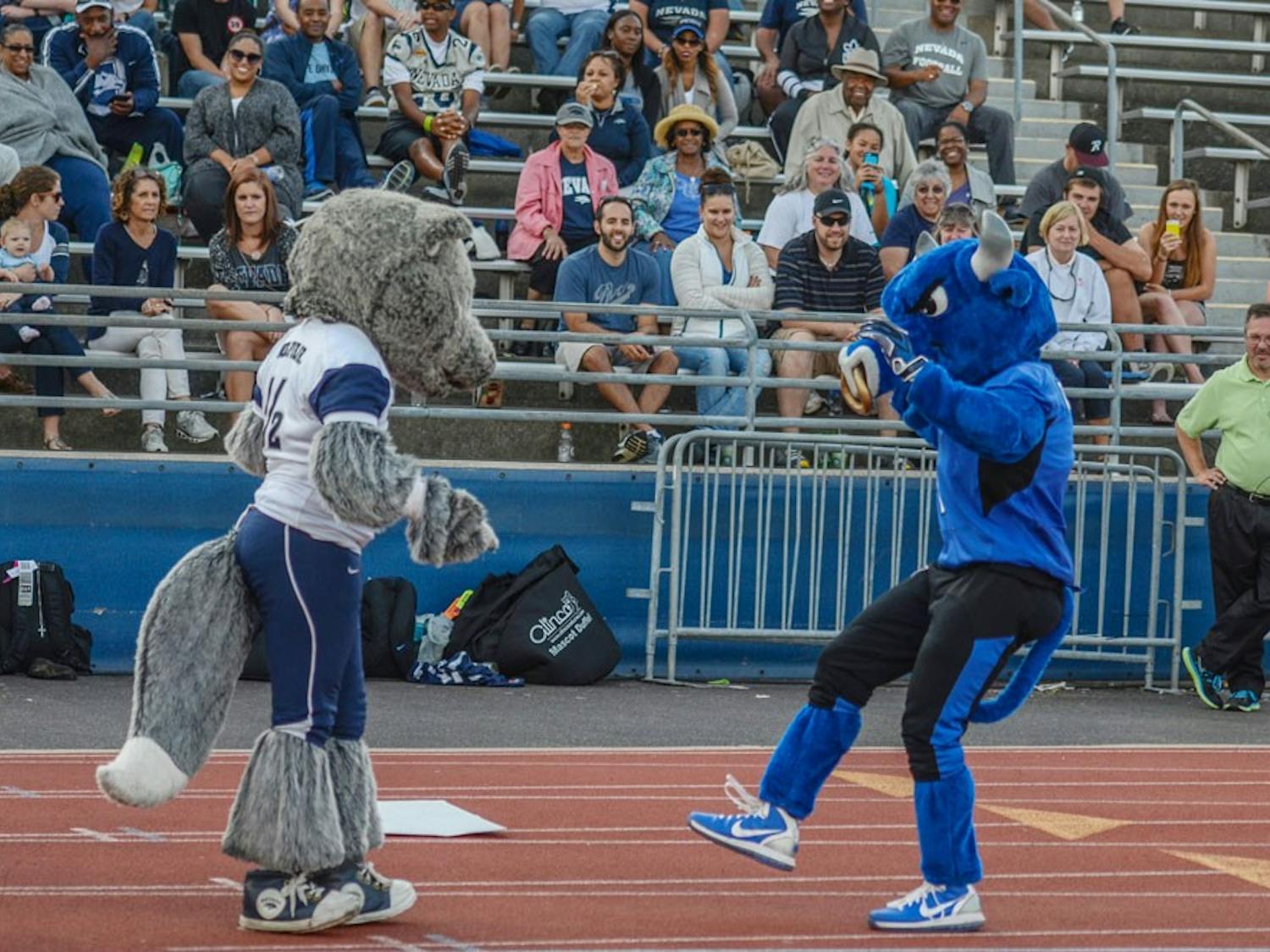 Victor E. Bull has a dance-off with an opposing mascot. The current student who wears the mascot suit says he has incorporated dancing as a bigger part of the character.