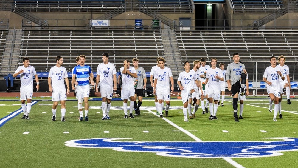 <p>UB men's soccer warms up prior to a game. The men's soccer team has been cut from UB Athletics.</p>