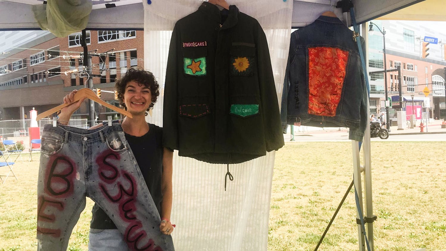 Julia Erbacher selling upcycled pieces at a local art festival.