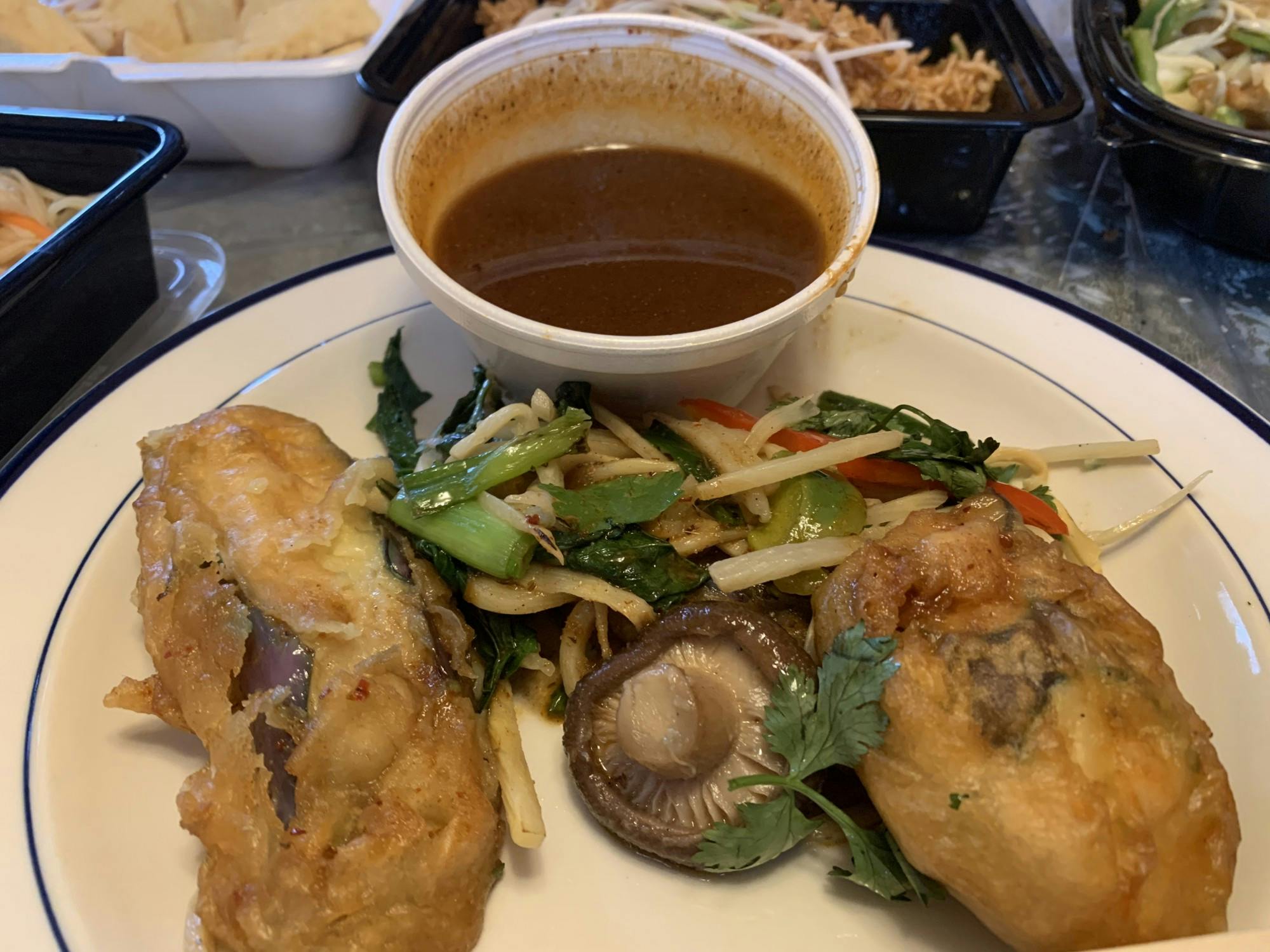 Bamboo shoots, parsley and mushrooms add complexity to the hot eggplant.