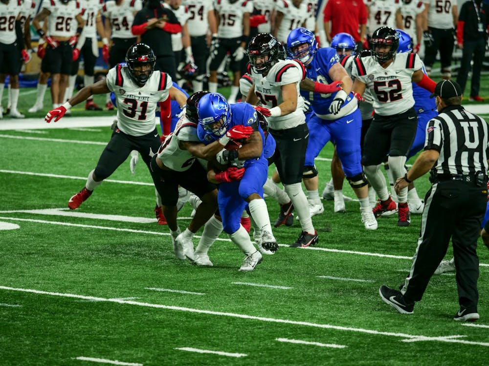 Junior running back Jaret Patterson rushes for a first down against Ball State in the MAC Championship Game.