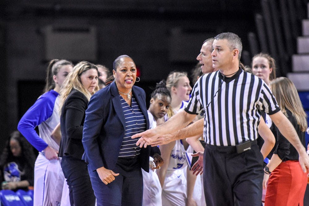 <p>Head coach Felisha Legette-Jack argues with a referee during Buffalo's 70-55 loss to Eastern Michigan at Alumni Arena on Wednesday.&nbsp;</p>