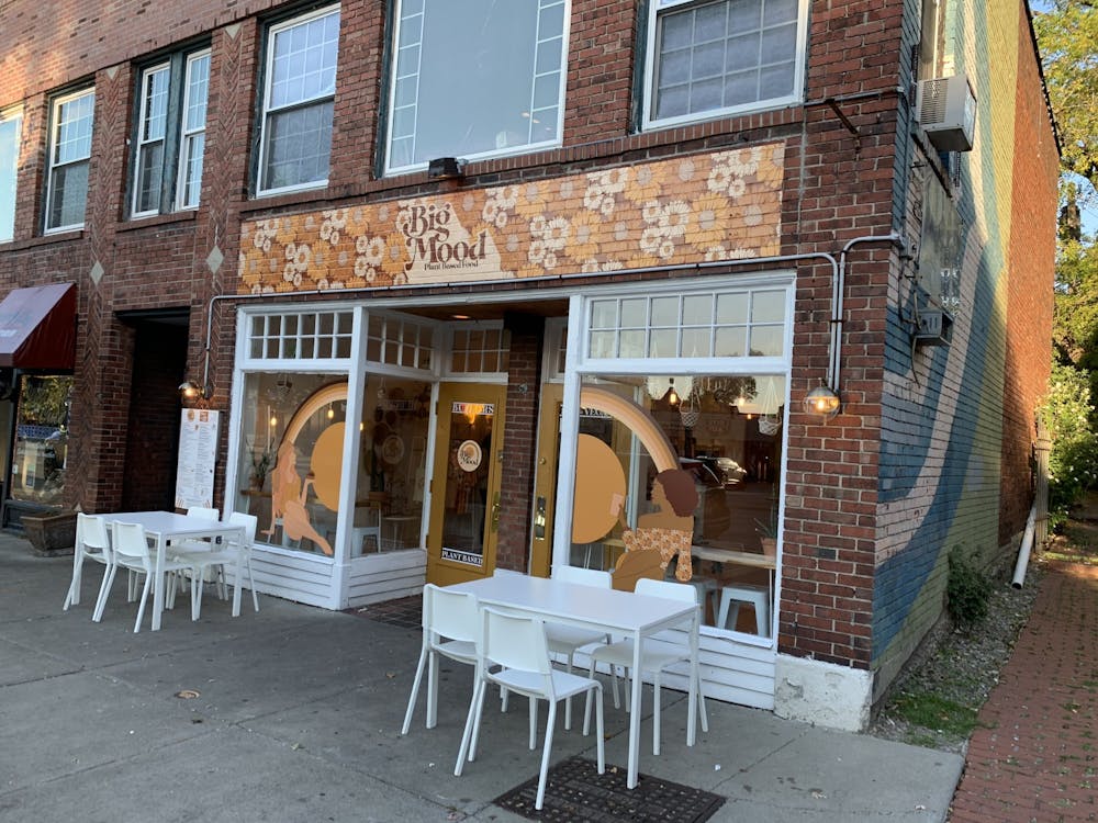<p>From the inside, Big Mood on Elmwood looks less like a restaurant and more like your cool aunt’s ‘70s-themed apartment.</p>