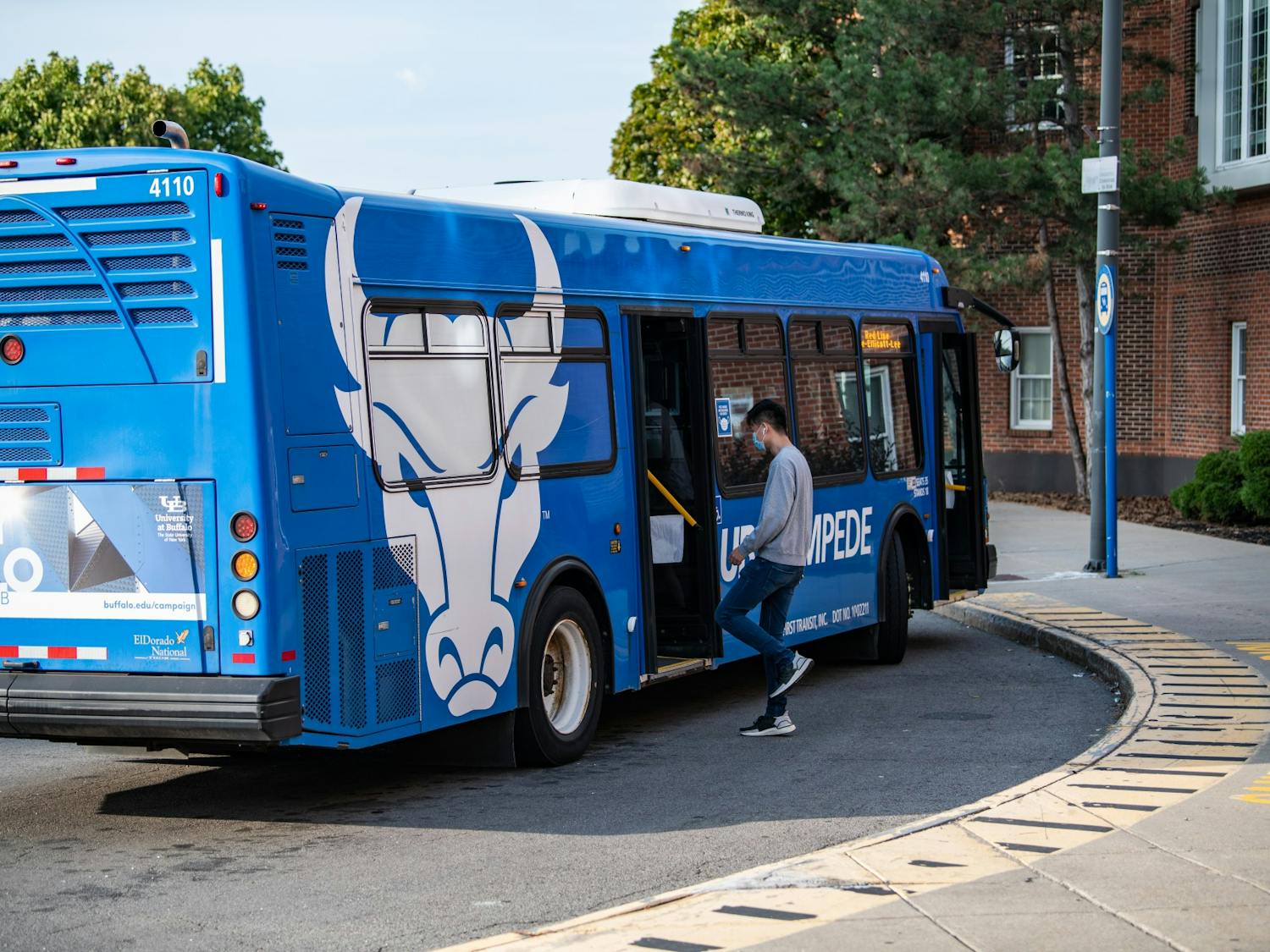 Students board the Stampede during the fall 2020 semester. Parking and Transportation Services says an operator shortage is to blame for reduced operations.