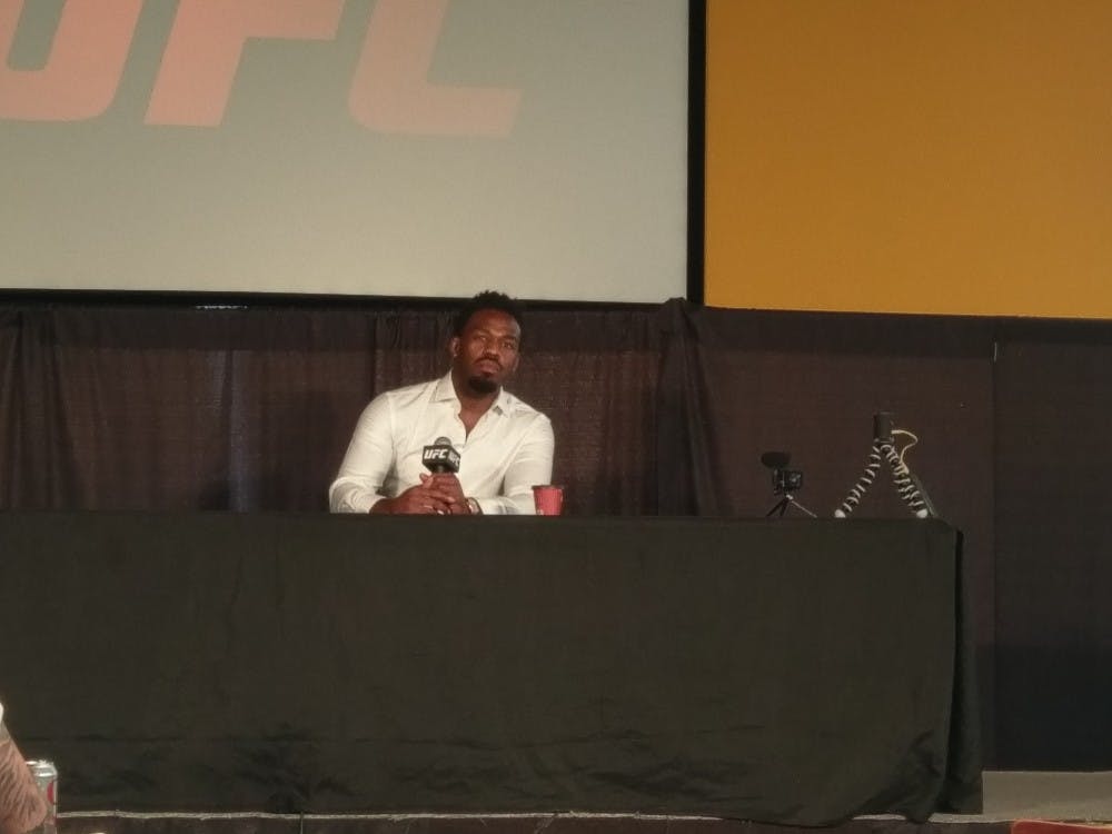 <p>UFC fighter Jon Jones fields questions during a press conference at the KeyBank center Friday. Jones is in Buffalo to promote UFC 210 on&nbsp;Saturday.&nbsp;</p>