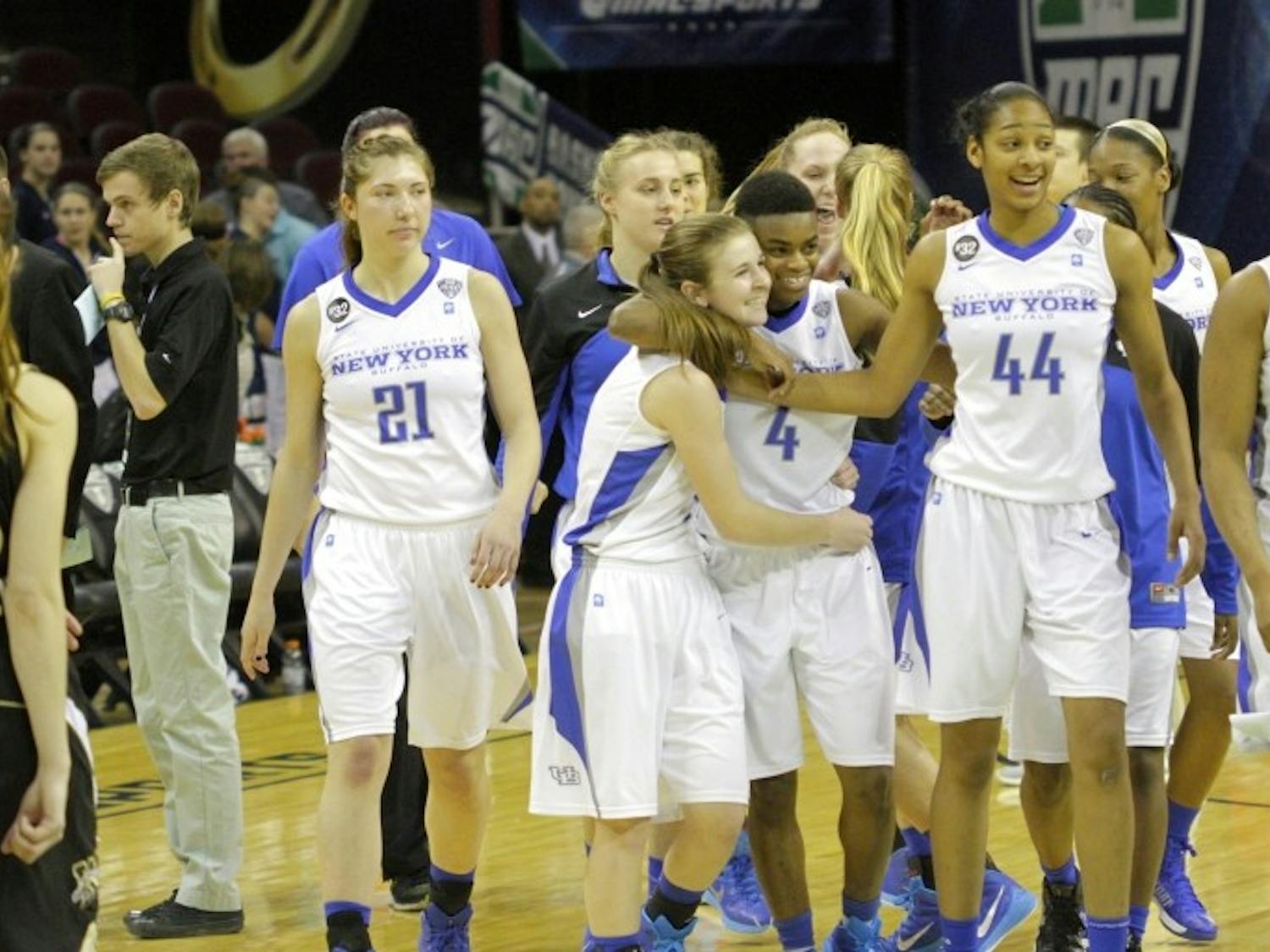 The women's basketball team celebrates its MAC quarterfinals win over Western Michigan in Quicken Loans Arena on March 12. The Bulls face West Virginia Thursday in the team's first ever WNIT appearance. 