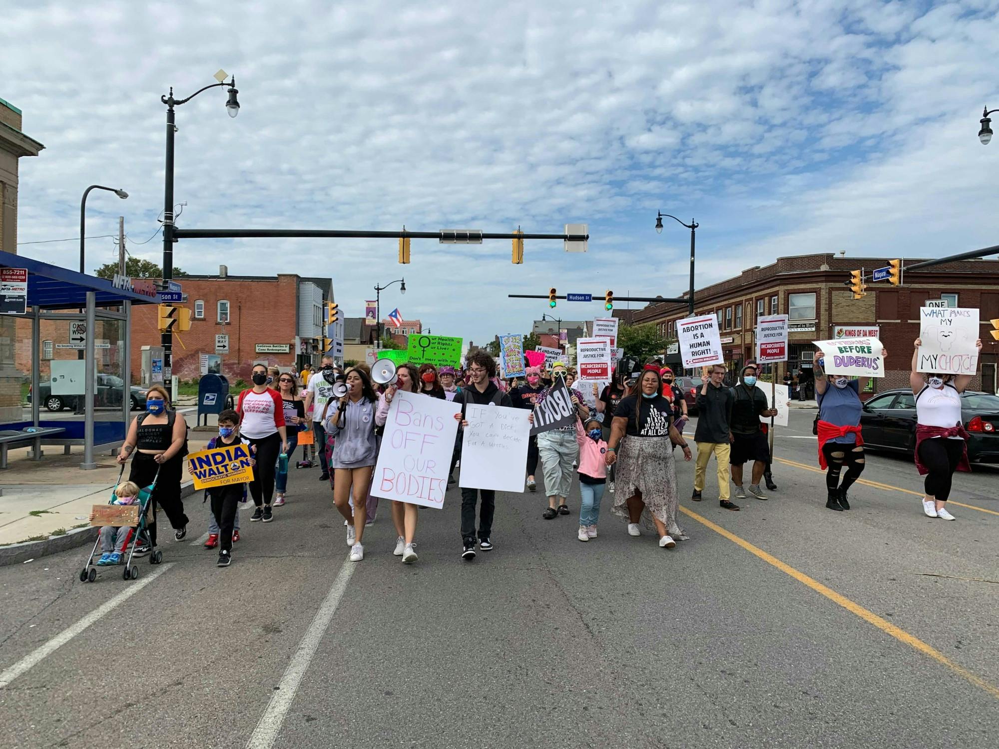 Chants and honking horns filled the streets as protesters marched down Niagara Street from Prospect Park.