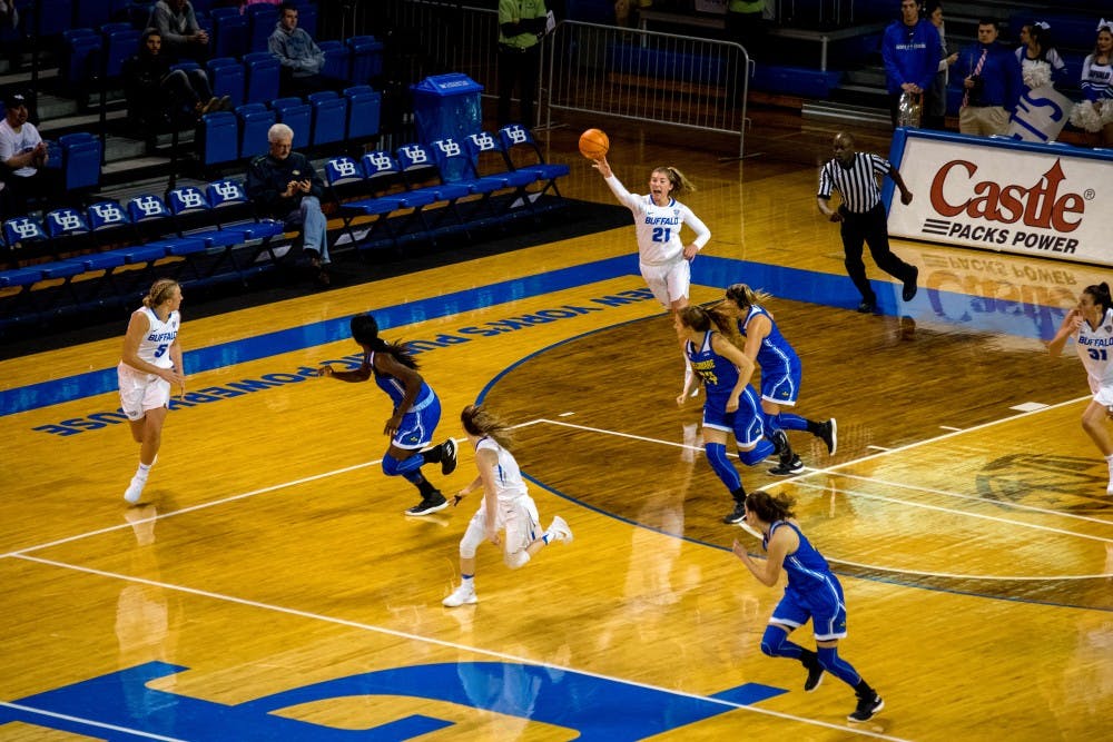 <p>Senior forward Mariah Suchan passes the ball down court. The Bulls have a big game against Central Michigan on Wednesday at 7 p.m.</p>