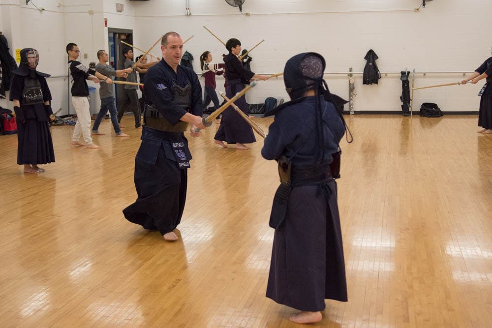 <p>Members of the UB Kendo club practice in Alumni Arena. The club is focused on Japanese culture and teaches members the importance of honor and discipline.&nbsp;</p>