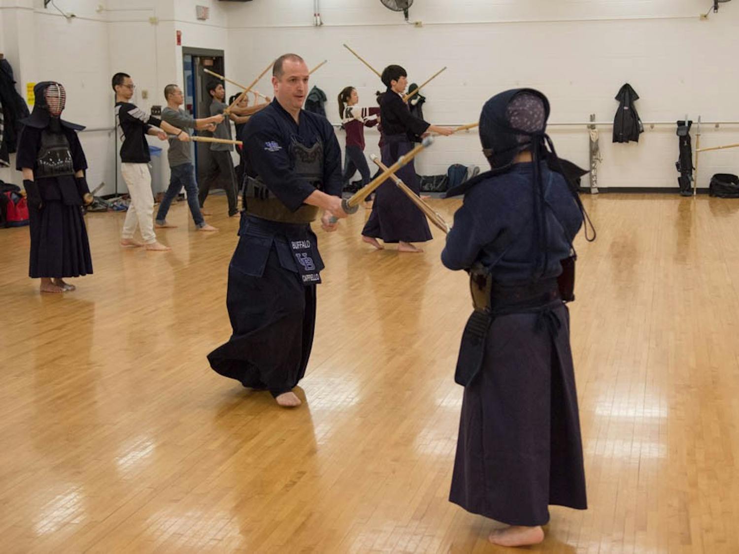 Members of the UB Kendo club practice in Alumni Arena. The club is focused on Japanese culture and teaches members the importance of honor and discipline. 