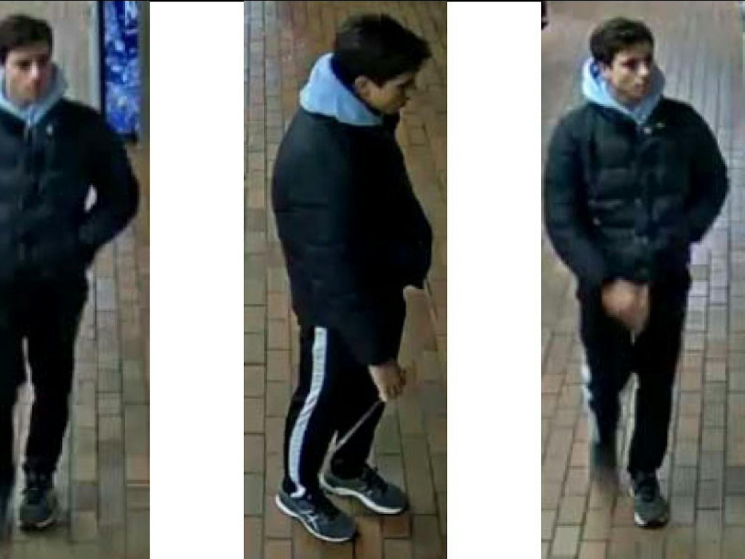 The suspect appears to be a dark-haired male between 18-25 years old, last seen wearing a dark colored puffy jacket over a gray hoodie with black pants with a white stripe down the legs and Asics sneakers.