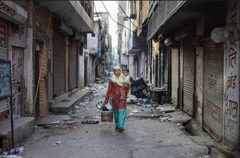 <p>Residents of Chand Bagh in northeast Delhi leaving their homes amid the riots.</p>