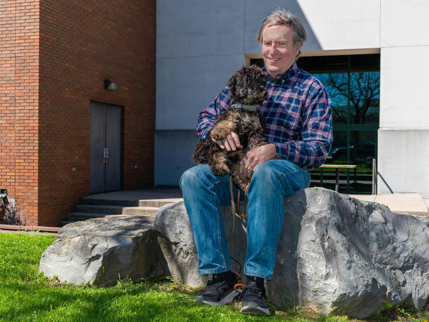 Dan Ryan, director of Veteran Services, and his new puppy, Finn, are inseparable.