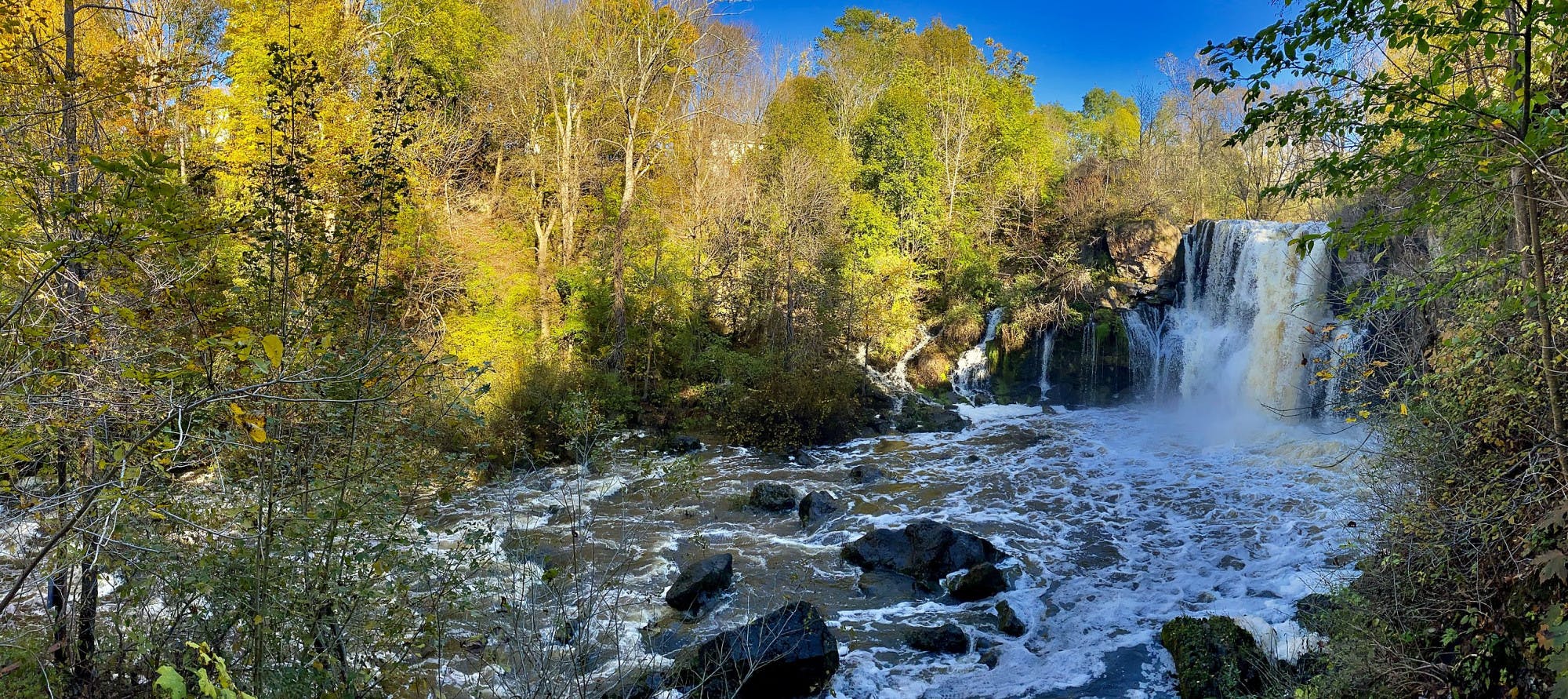 Akron Falls is spectacular in the spring, but it's worth checking out in the winter too — the waterfall turns completely to ice.