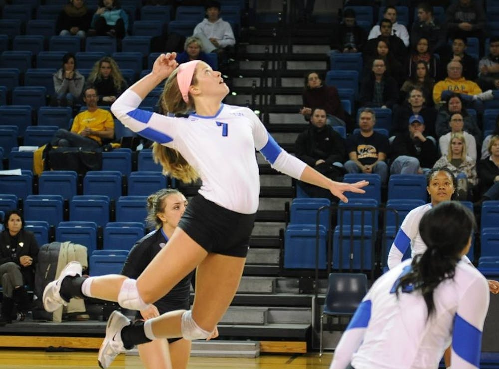 <p>Senior outside hitter Megan Lipski goes for a kill in a game at Alumni Arena last season. The volleyball team has yet to win a game this season. </p>