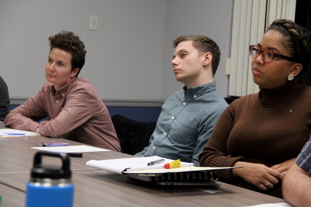 <p>UB Council of Advocacy and Leadership meeting held last Wednesday. Graduate Student Association President Tanja Aho (left), Student Wide Judiciary Chief Justice Joe Wolf (center) and Undergraduate Student Association President Leslie Veloz (right) sitting in at a meeting.</p>