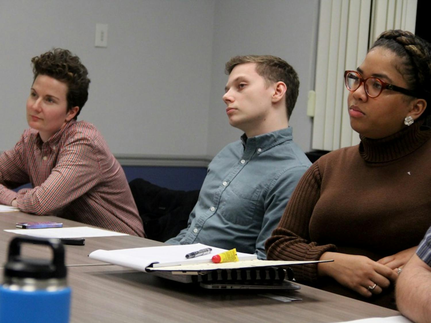 UB Council of Advocacy and Leadership meeting held last Wednesday. Graduate Student Association President Tanja Aho (left), Student Wide Judiciary Chief Justice Joe Wolf (center) and Undergraduate Student Association President Leslie Veloz (right) sitting in at a meeting.