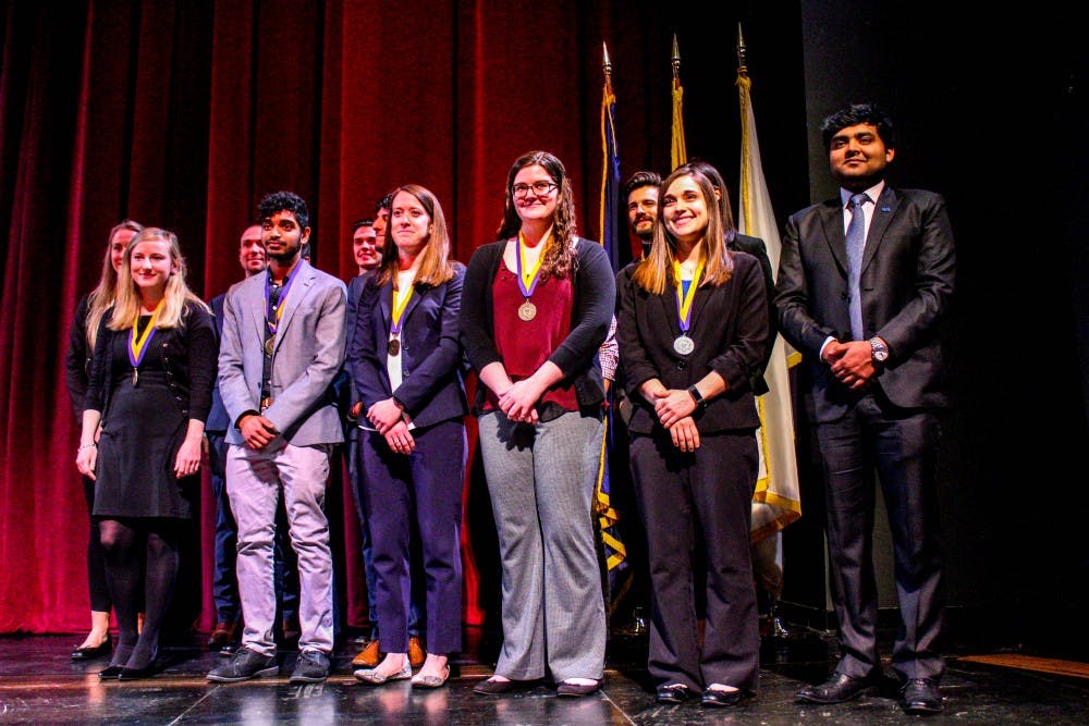 Recipients of the Chancellor's Award for Student Excellence standing on stage during UB’s annual Celebration of Excellence.&nbsp;