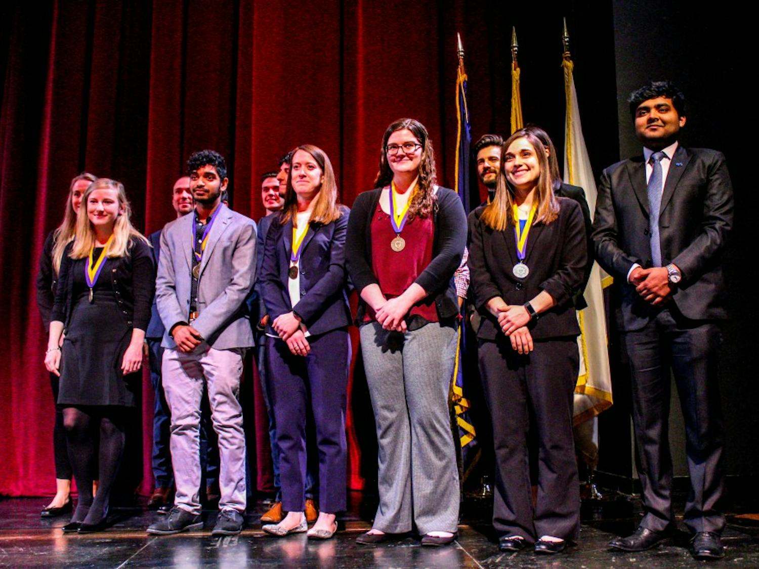Recipients of the Chancellor's Award for Student Excellence standing on stage during UB’s annual Celebration of Excellence.&nbsp;