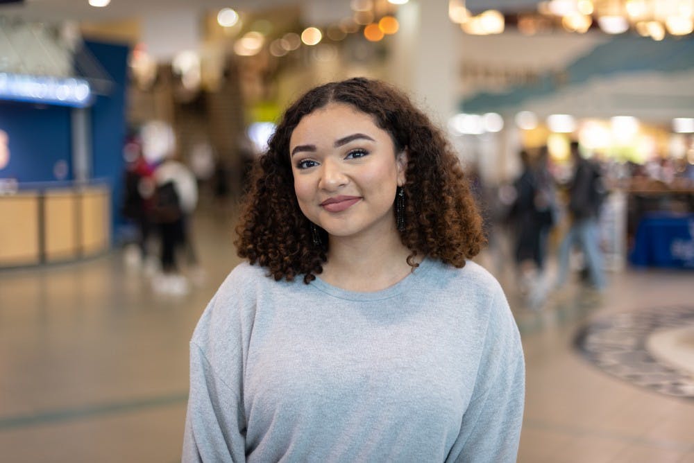 <p>Student Gabriella Hall in the SU Lobby.</p>