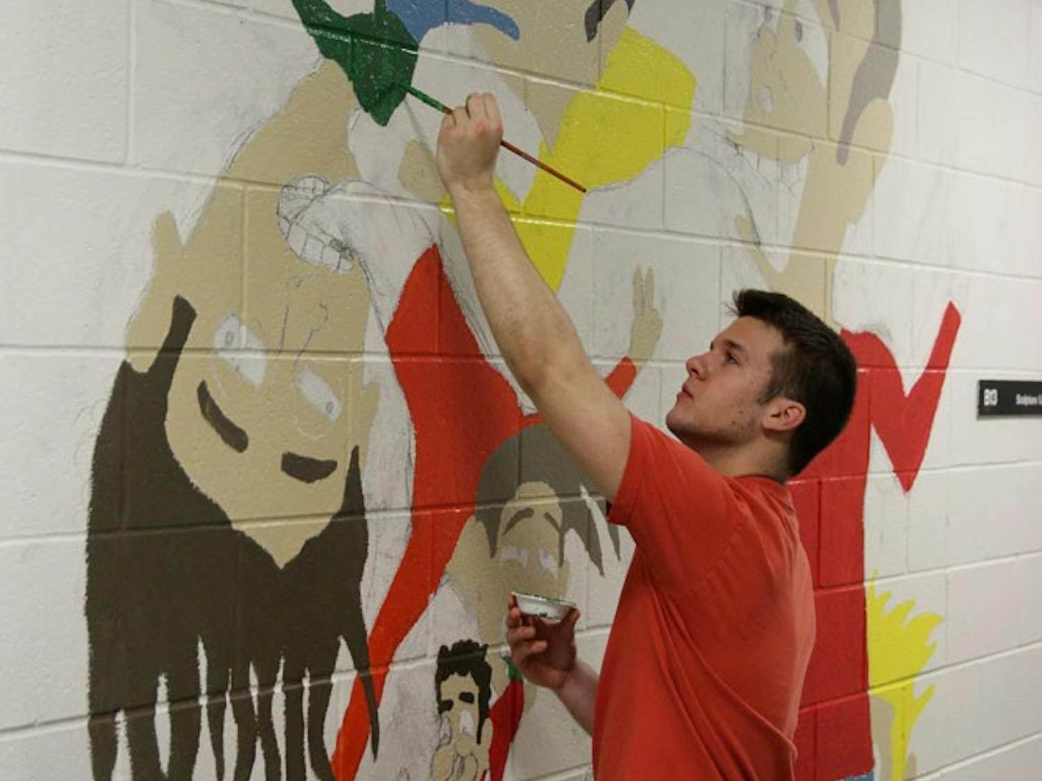 Michael Perlman, a sophomore fine arts and communication major, said students will often stop and give him support with his work, drawn to the intricate and spiraling designs - he said he wanted his mural to be “as crazy as possible."