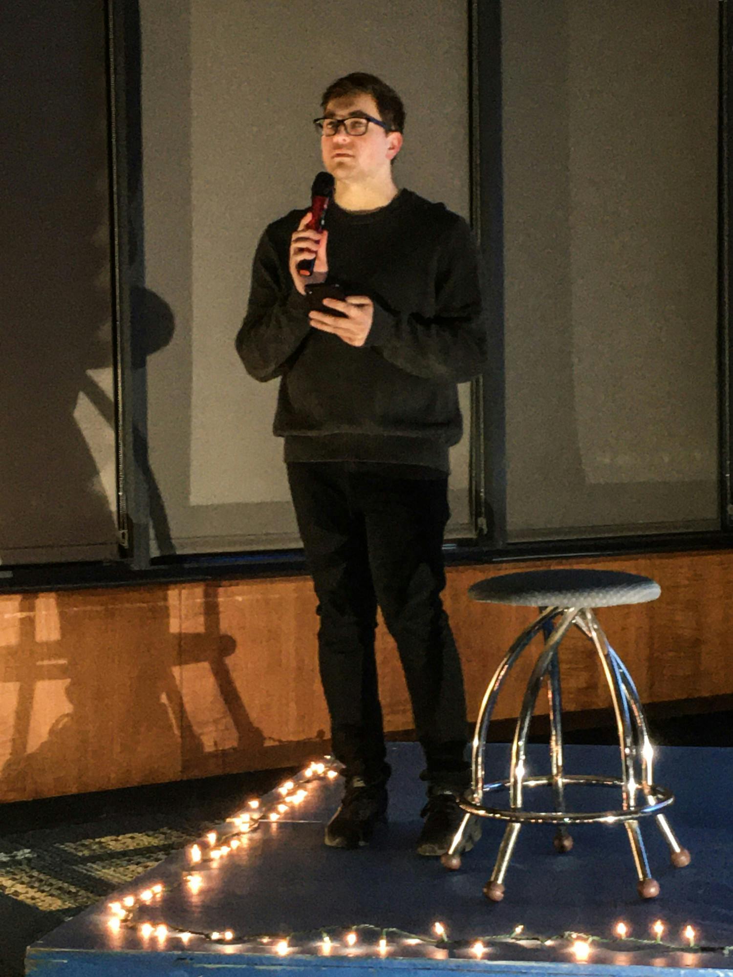 Student reads poem to students about the need for diversity.