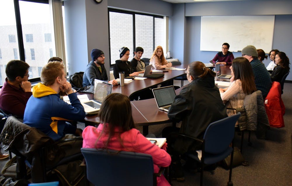<p>English students sit in critical race theory, a 400-level English class. Starting in the fall, the requirements to complete the English major are decreasing in difficulty in order to encourage more students to become English majors.</p>