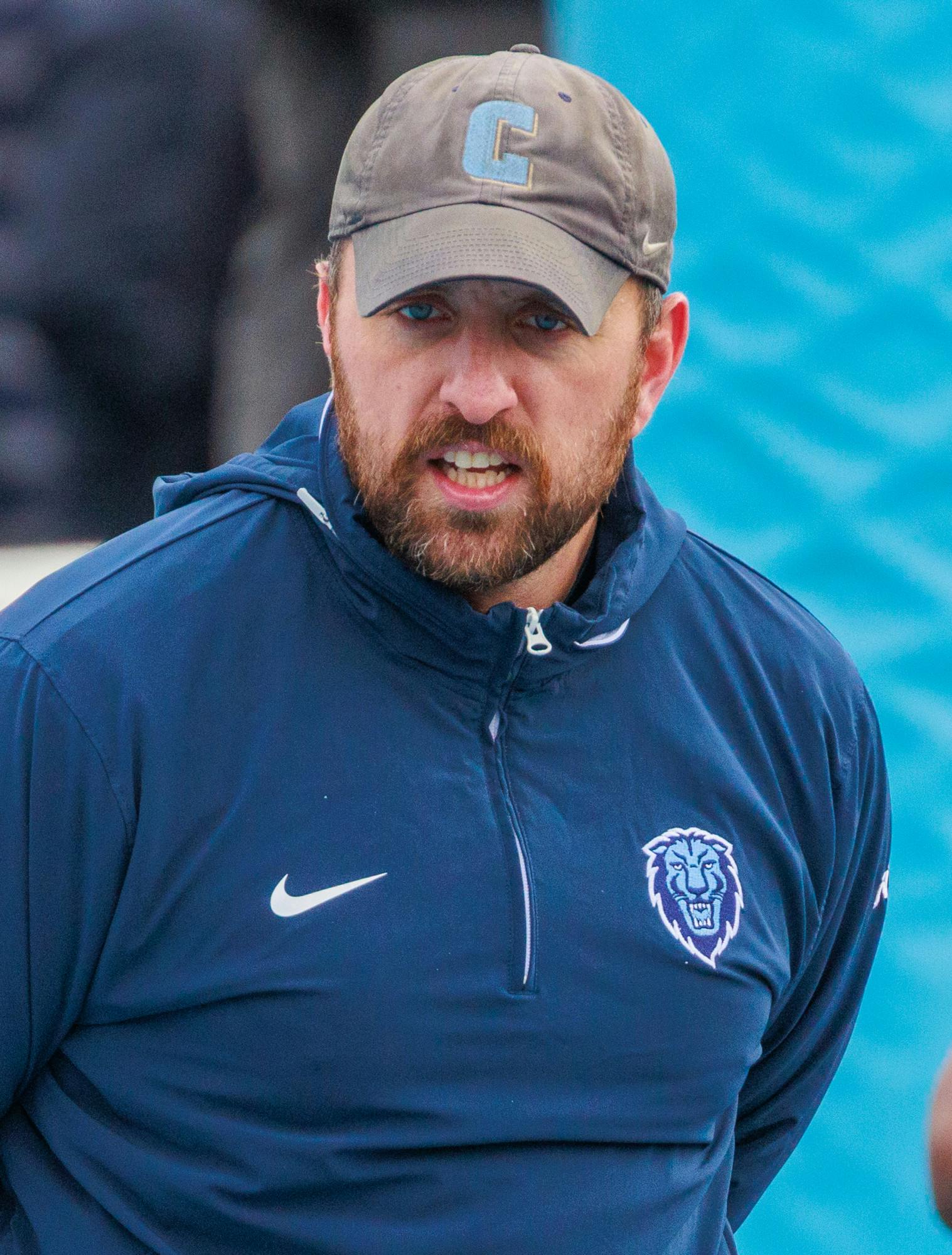 Garrett McLaughlin as Columbia defensive line coach and special teams coordinator. 