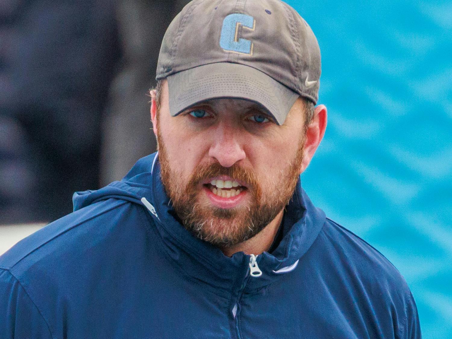 Garrett McLaughlin as Columbia defensive line coach and special teams coordinator.