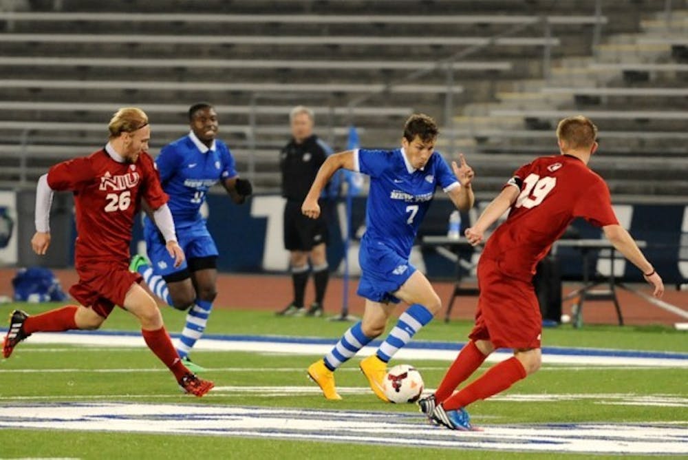 <p>Sophomore midfielder Russell Cicerone dribbles the ball in Buffalo’s 2-1 victory over Northern Illinois Oct. 25.</p>