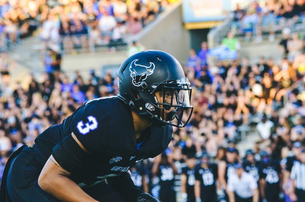 <p>Redshirt freshman Aapri Washington readies himself before the snap of the ball. The Bulls take on the Army Black Knights for the third consecutive year at 12 p.m. on Saturday.</p>