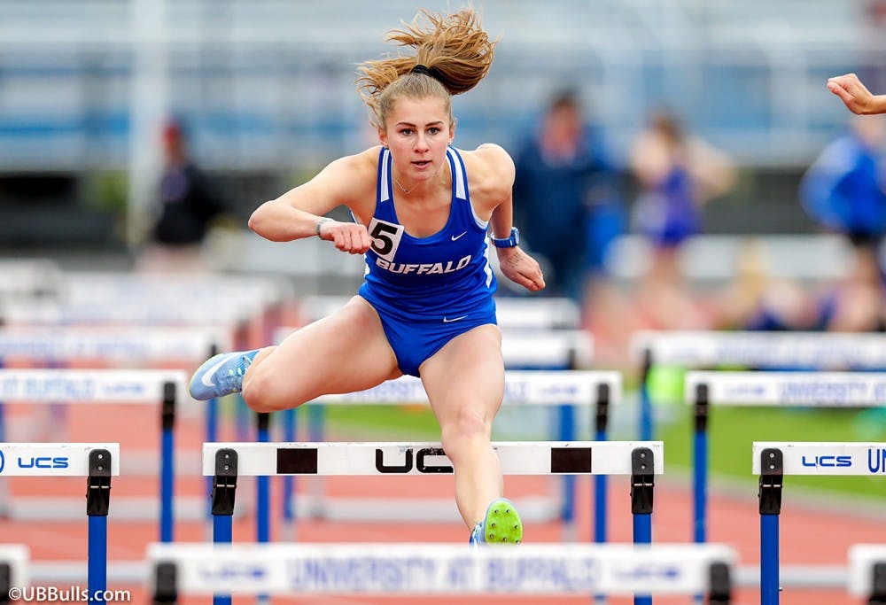<p>Junior hurdler and high jumper Selina Von Jackowski jumping over hurdles. Von Jackowski is looking to continue her success this season at this weekend's MAC championships.</p>