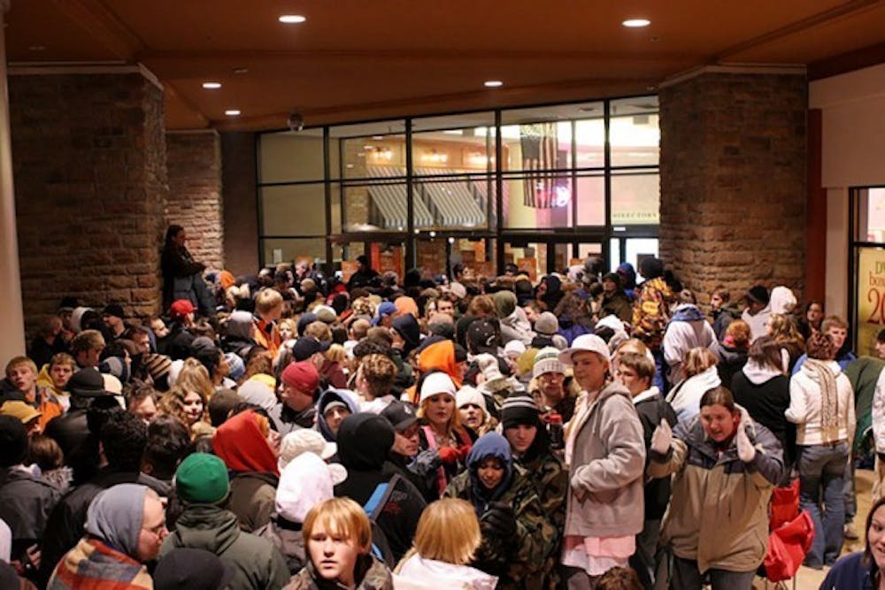 Shoppers on Black Friday wait eagerly to get into their stores of choice.&nbsp;The Walden Galleria Mall in the Buffalo-area is one of many across the nation to begin its Black Friday hours on the day of Thanksgiving.&nbsp;Courtesy of Robert Barney